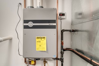 a tankless water heater can be part of a home renovation, to free up needed space